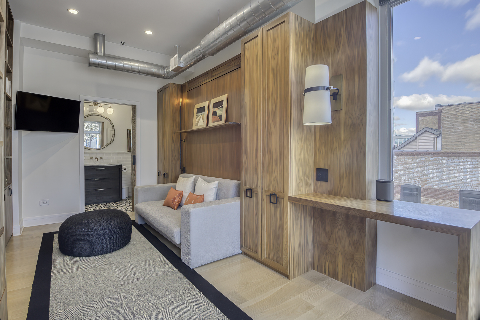 910 West Madison Street, Unit 904E Chicago, IL 60607 - Photo 40 of 56 a living room with furniture and a fireplace