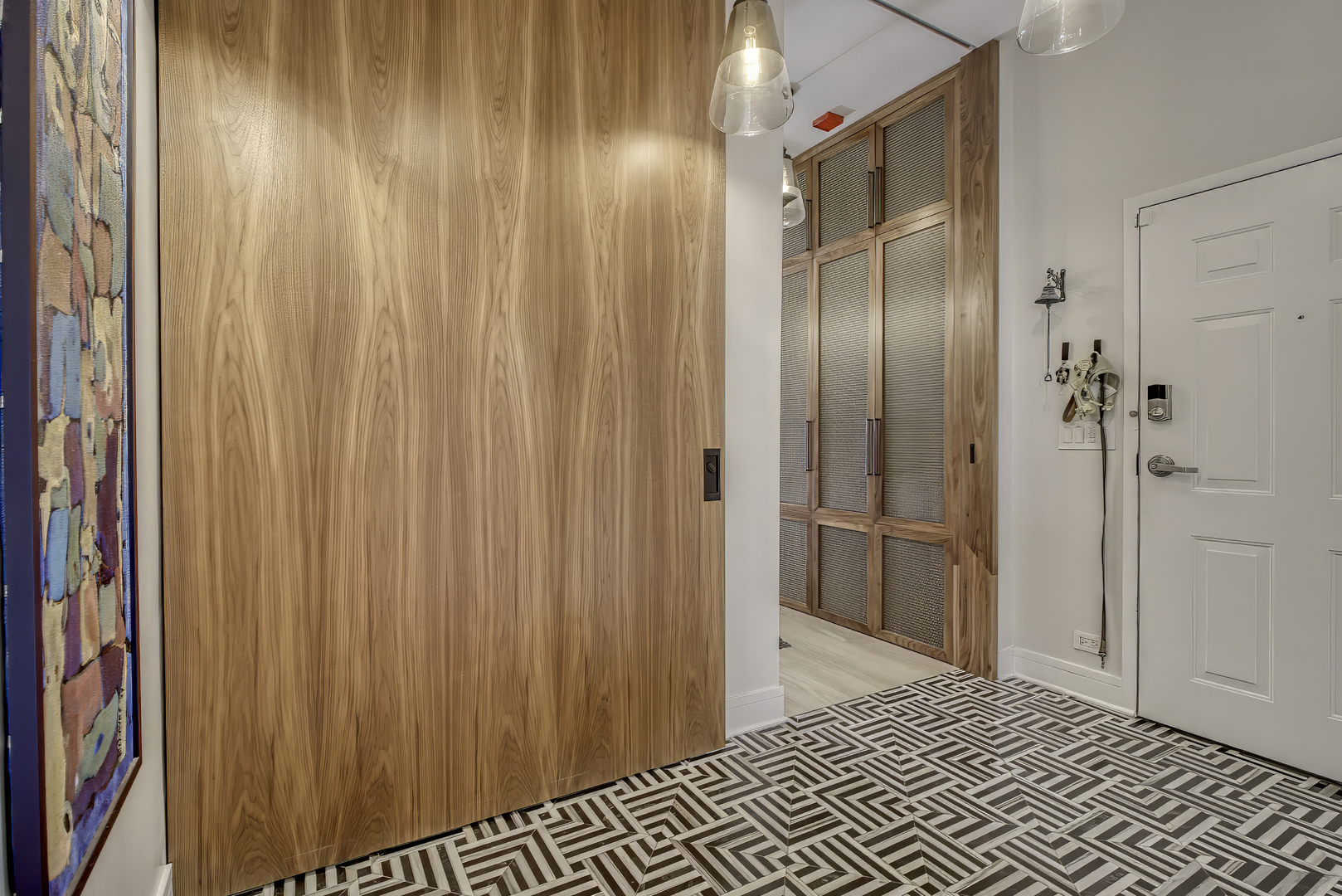 910 West Madison Street, Unit 904E Chicago, IL 60607 - Photo 4 of 56 a bathroom with a mirror and a shower