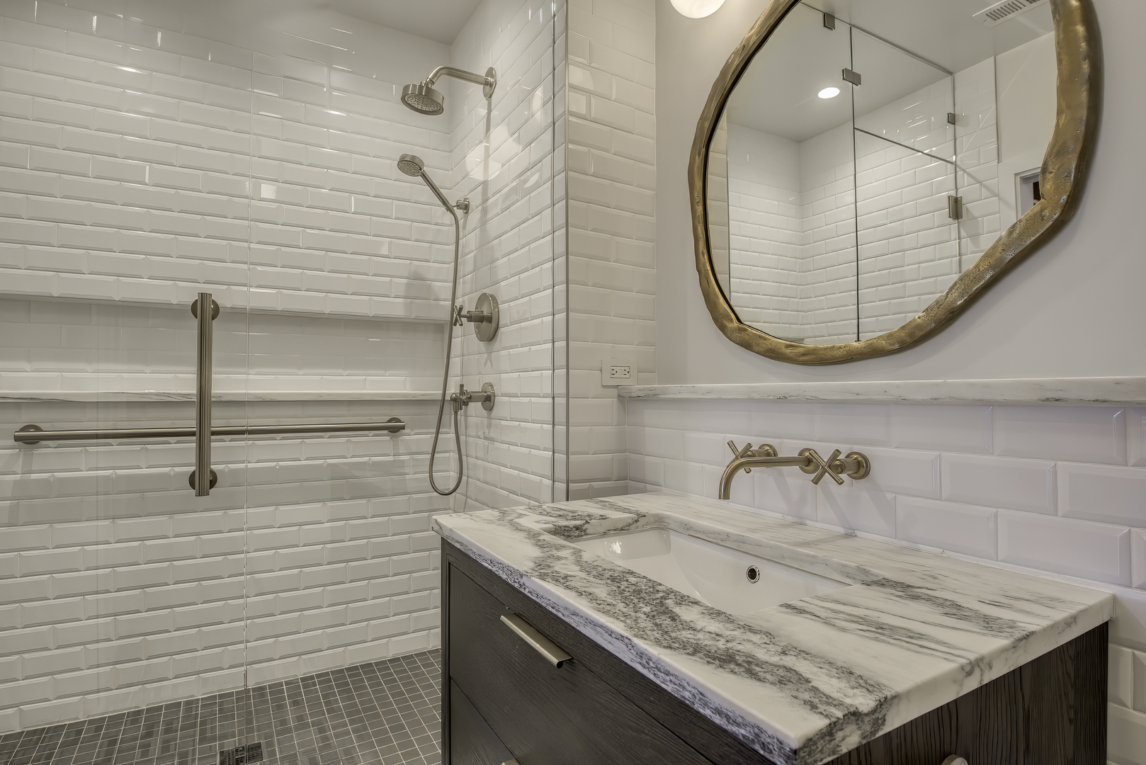 910 West Madison Street, Unit 904E Chicago, IL 60607 - Photo 43 of 56 a bathroom with a sink and a mirror