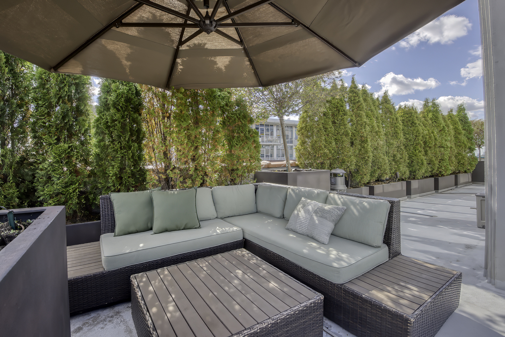 910 West Madison Street, Unit 904E Chicago, IL 60607 - Photo 49 of 56 a view of a couches in a patio