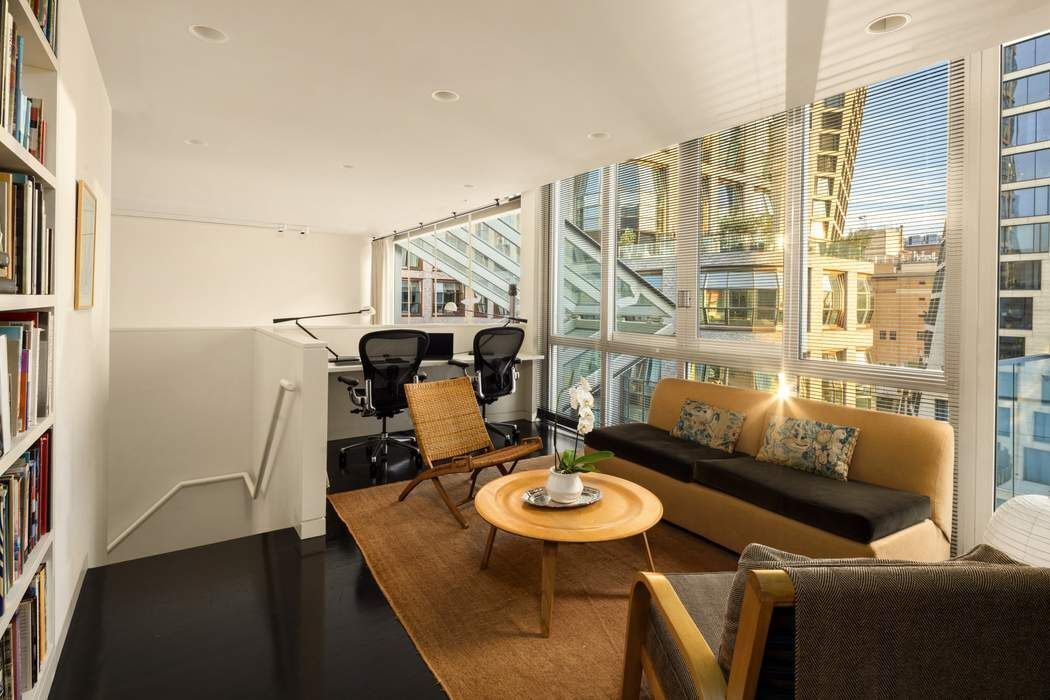 524 West 19th Street, Unit PH Manhattan, NY 10011 - Photo 14 of 27 a living room with furniture and a floor to ceiling window