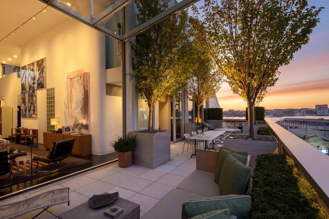 524 West 19th Street, Unit PH Manhattan, NY 10011 - Photo 4 of 27 a view of a patio with couches chairs and a barbeque