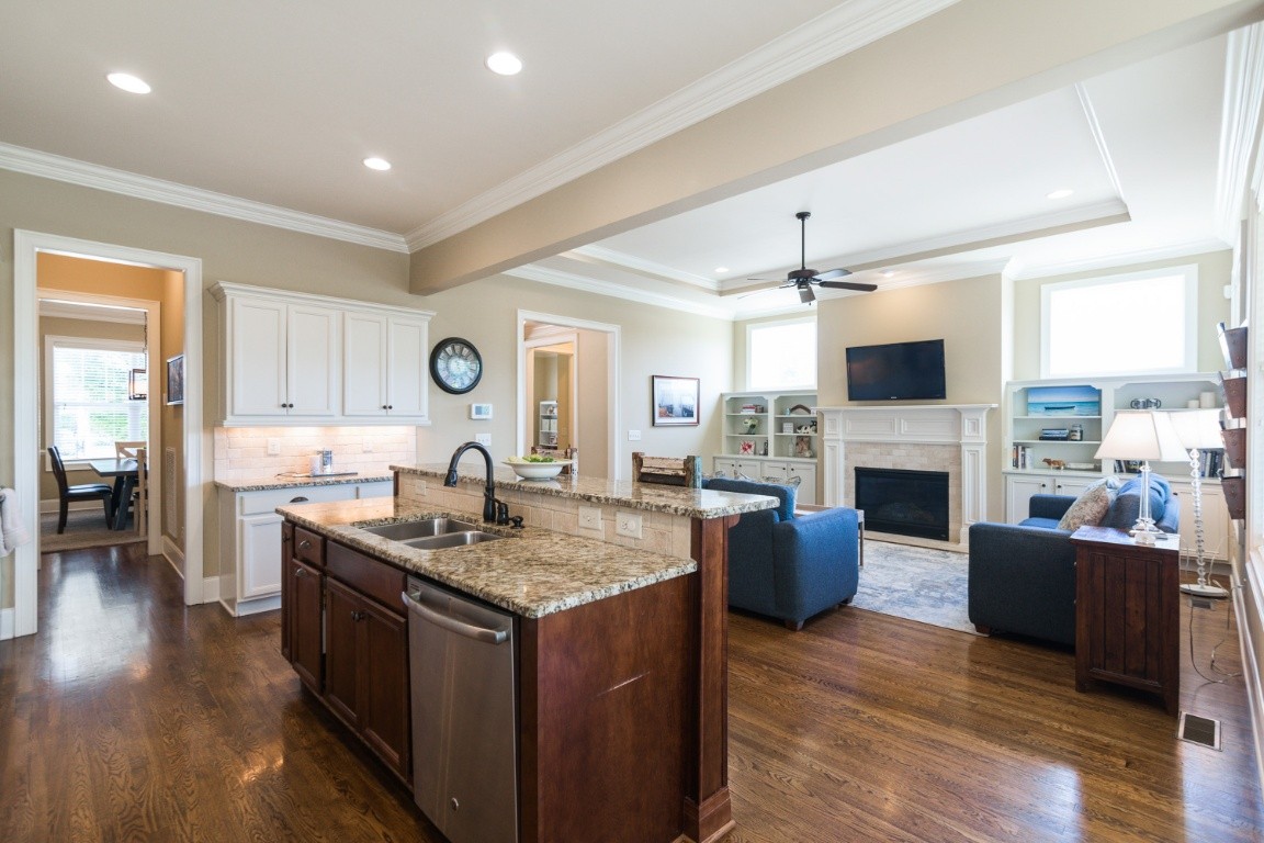 192 Barlow Drive Franklin, TN 37064 - Photo 12 of 36 a living room with furniture and a fireplace