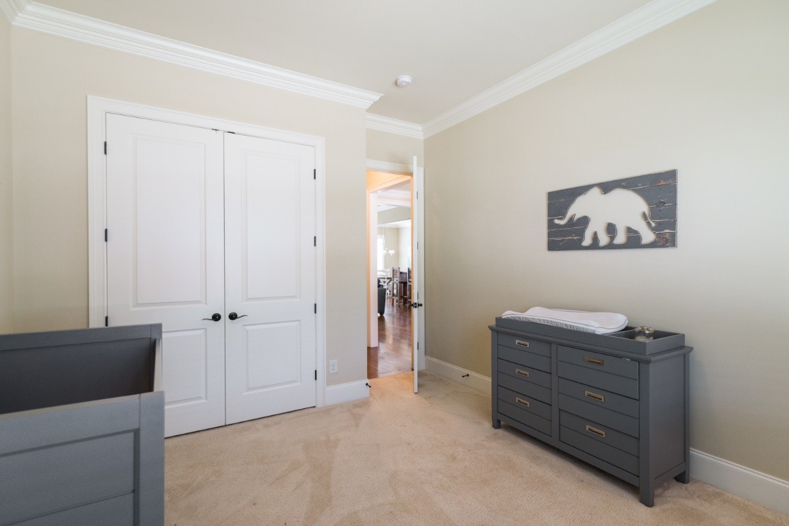 192 Barlow Drive Franklin, TN 37064 - Photo 20 of 36 a room that has a dresser in it