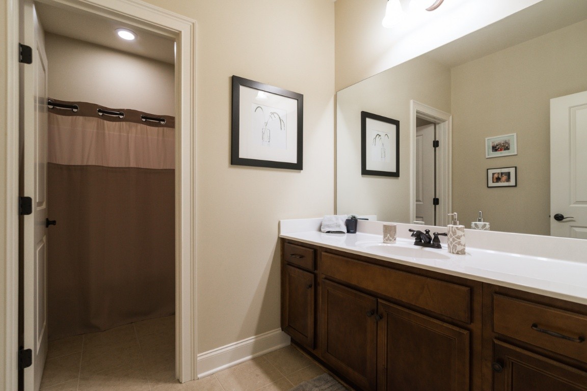 192 Barlow Drive Franklin, TN 37064 - Photo 23 of 36 a bathroom with a double vanity sink and mirror