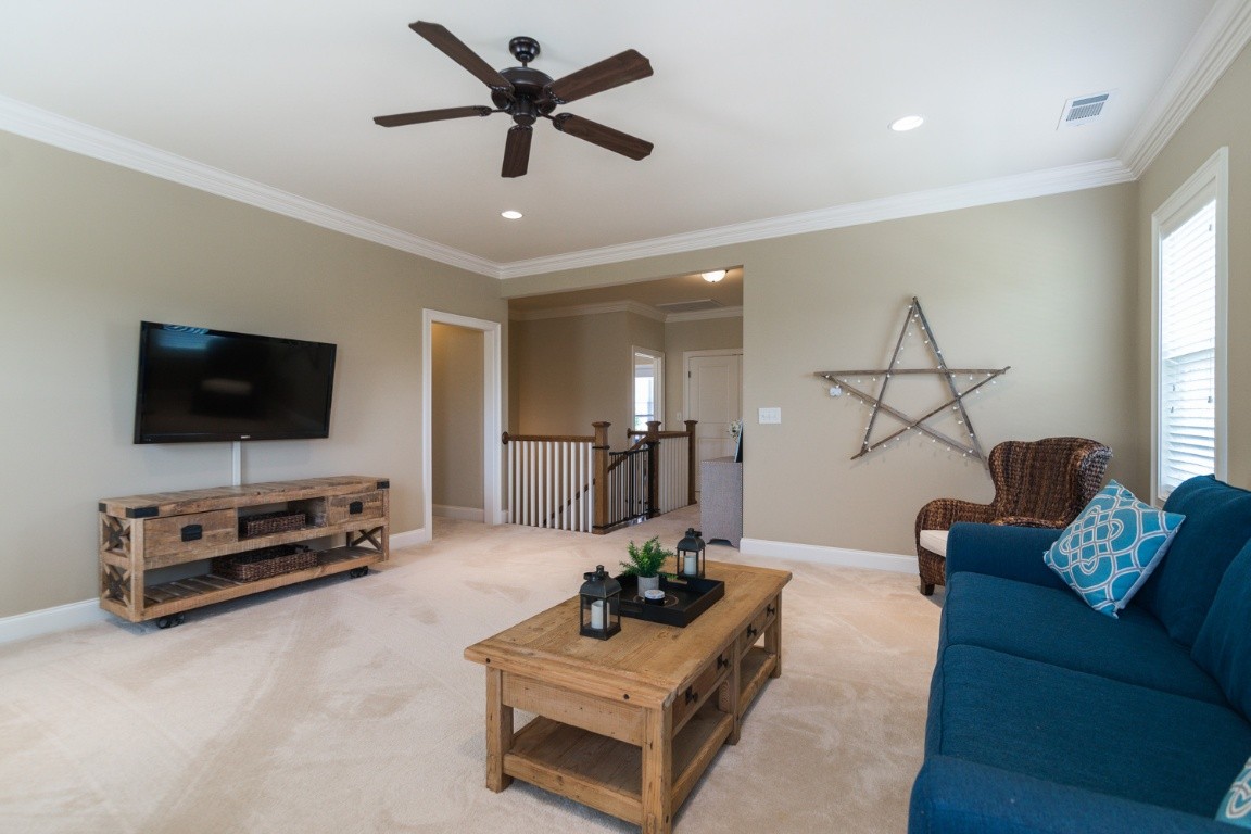 192 Barlow Drive Franklin, TN 37064 - Photo 29 of 36 a living room with furniture and a flat screen tv