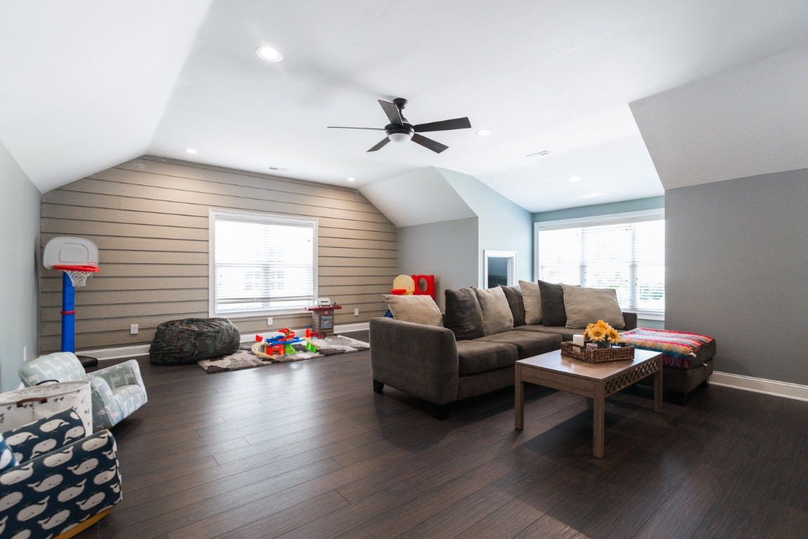 192 Barlow Drive Franklin, TN 37064 - Photo 30 of 36 a living room with furniture a window and a flat screen tv