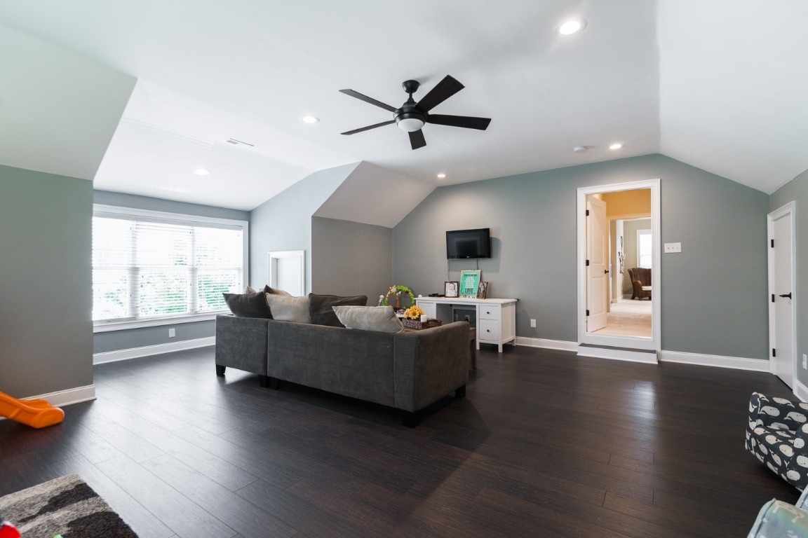 192 Barlow Drive Franklin, TN 37064 - Photo 31 of 36 a living room with furniture and a wooden floor