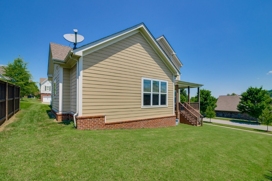 192 Barlow Drive Franklin, TN 37064 - Photo 34 of 36 a view of a house with a backyard