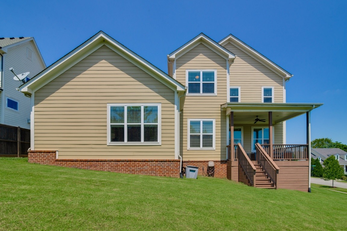 192 Barlow Drive Franklin, TN 37064 - Photo 35 of 36 a front view of a house with a yard porch and glass top