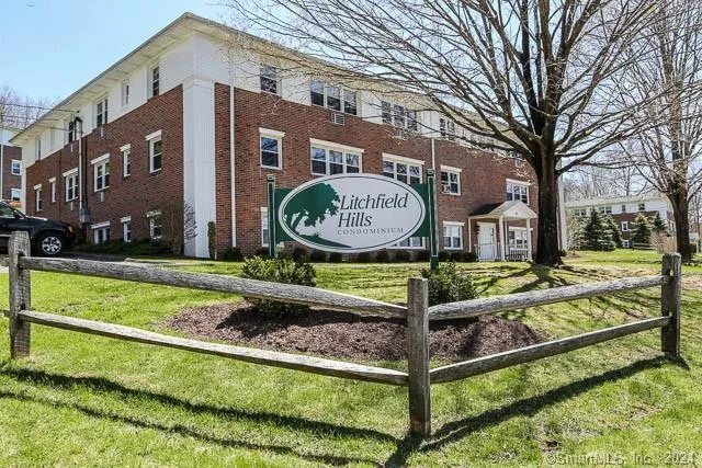 a view of a sign board with a park