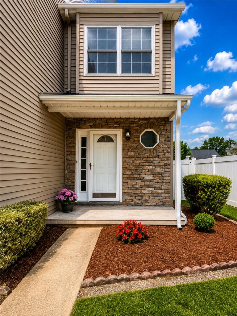 511 Howertown Road Northampton, PA 18067 - Photo 3 of 34 A welcoming stone and siding facade with a neat pathway invites you into this charming residence.