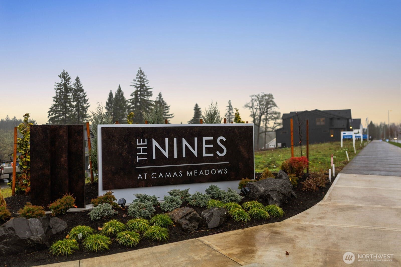 4599 Northwest 71st Avenue Camas, WA 98607 - Photo 2 of 40 a sign on the side of the building