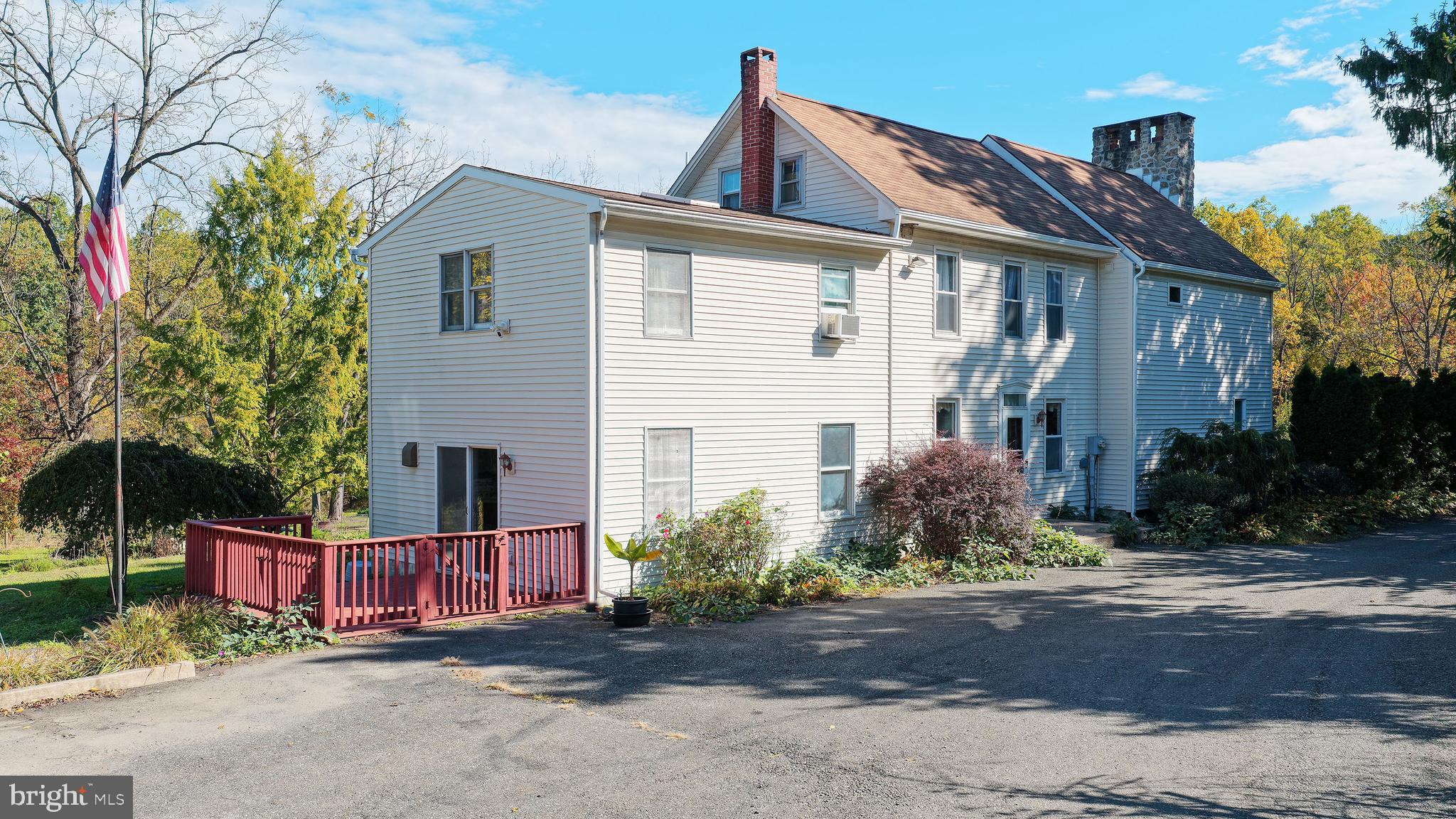a view of front of house with a yard