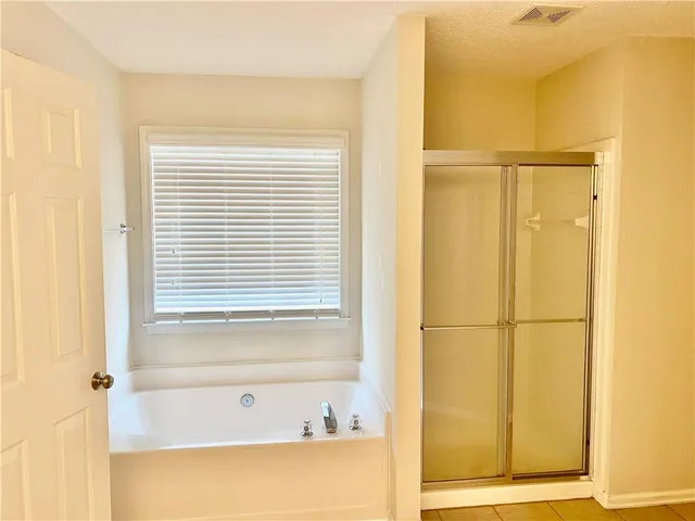 a bathroom with a bathtub