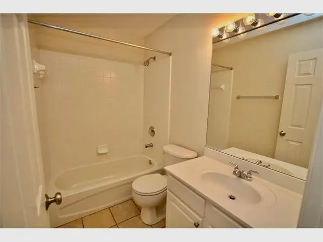 a view of a glass door with a floor to ceiling window