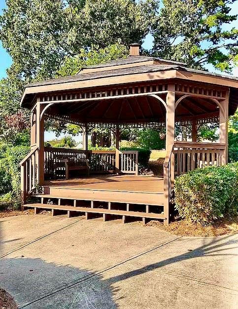 9020 Friarbridge Drive Suwanee, GA 30024 - Photo 45 of 48 a view of a swimming pool with a patio