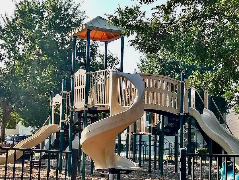 9020 Friarbridge Drive Suwanee, GA 30024 - Photo 47 of 48 a view of a roof deck with furniture and wooden deck