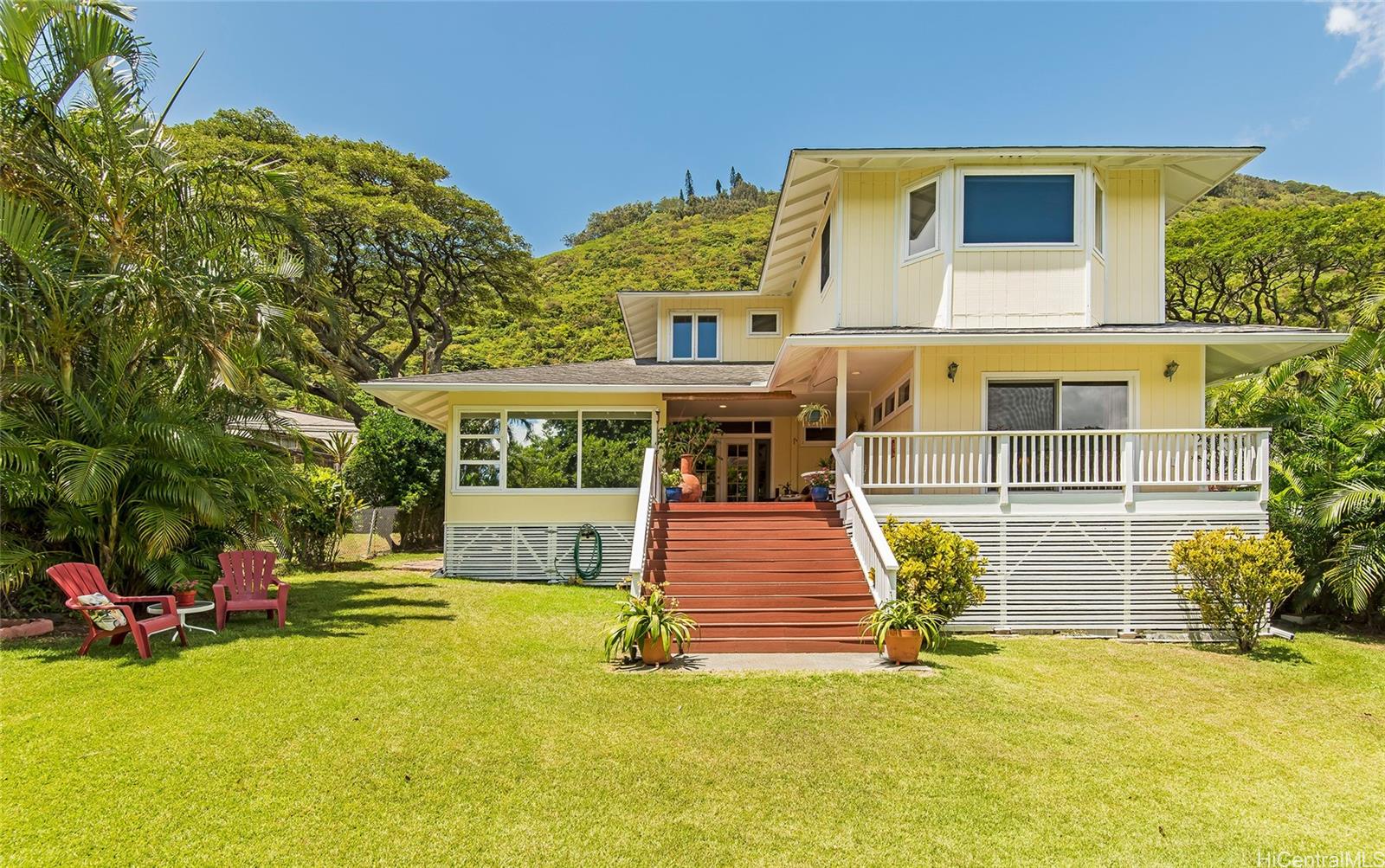 2929 Manoa Road Honolulu, HI 96822 - Photo 1 of 1 a front view of a house with a garden and yard