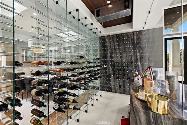 a bed room with a bed a couch and a window