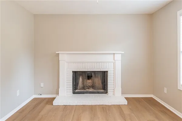 a living room with a fireplace