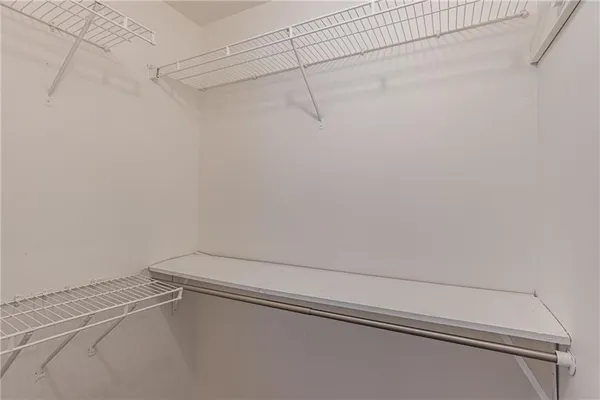 a view of a room with racks on the wall