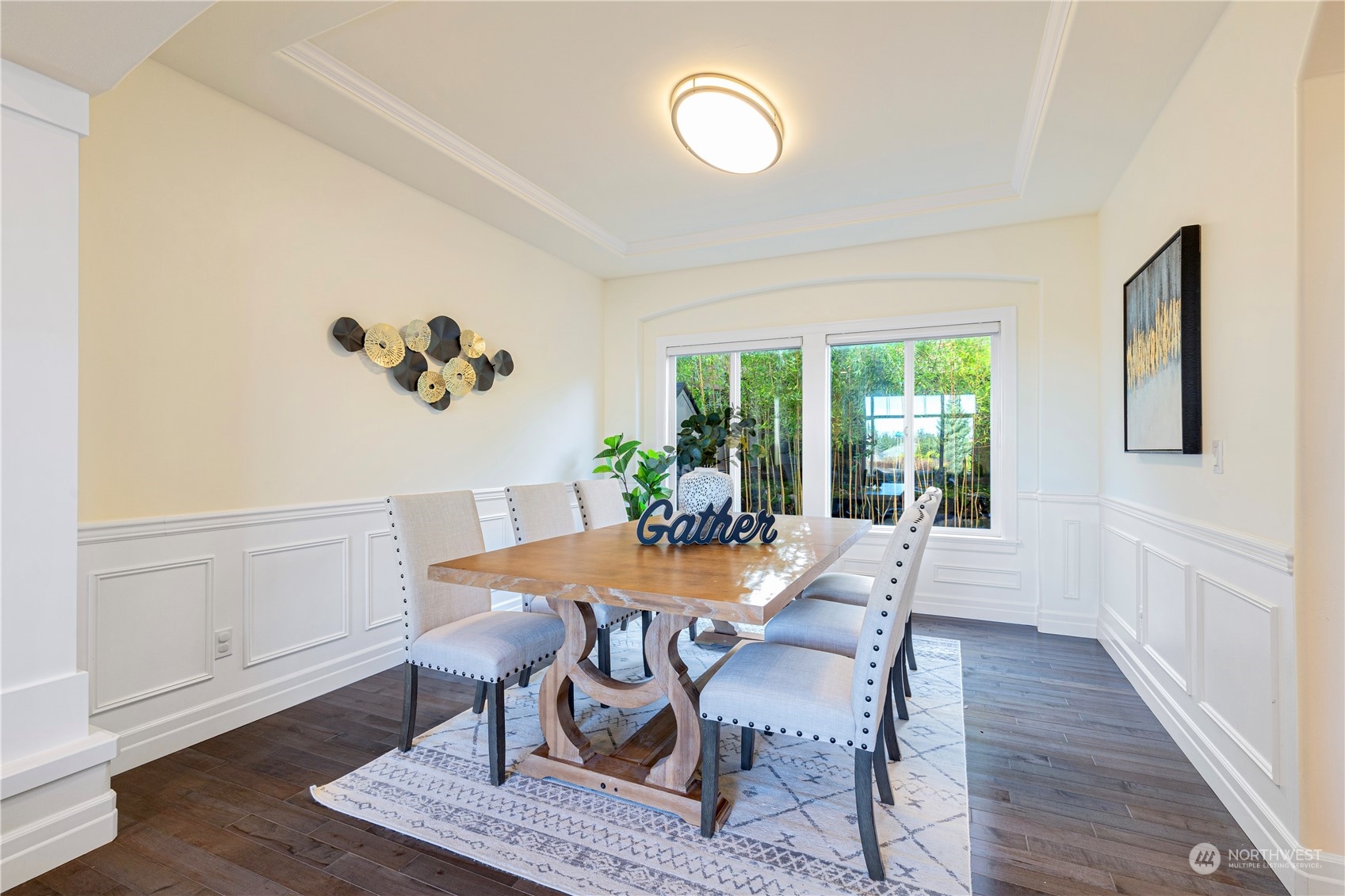 2019 Northeast 33rd Place Renton, WA 98056 - Photo 7 of 28 a view of a dining room with furniture window and wooden floor