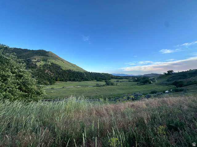 4250 East Cub River Road Preston, ID 83263 - Photo 4 of 18 Expansive natural landscape featuring rolling hills and verdant grasslands