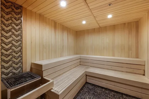 a bathroom with a bathtub and shower