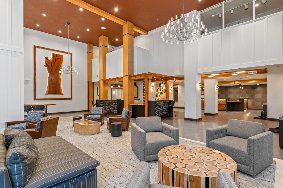 201 Shirley Cyn Road, Unit 247 Olympic Valley, CA 96146 - Photo 2 of 22 a living room with furniture and a large window