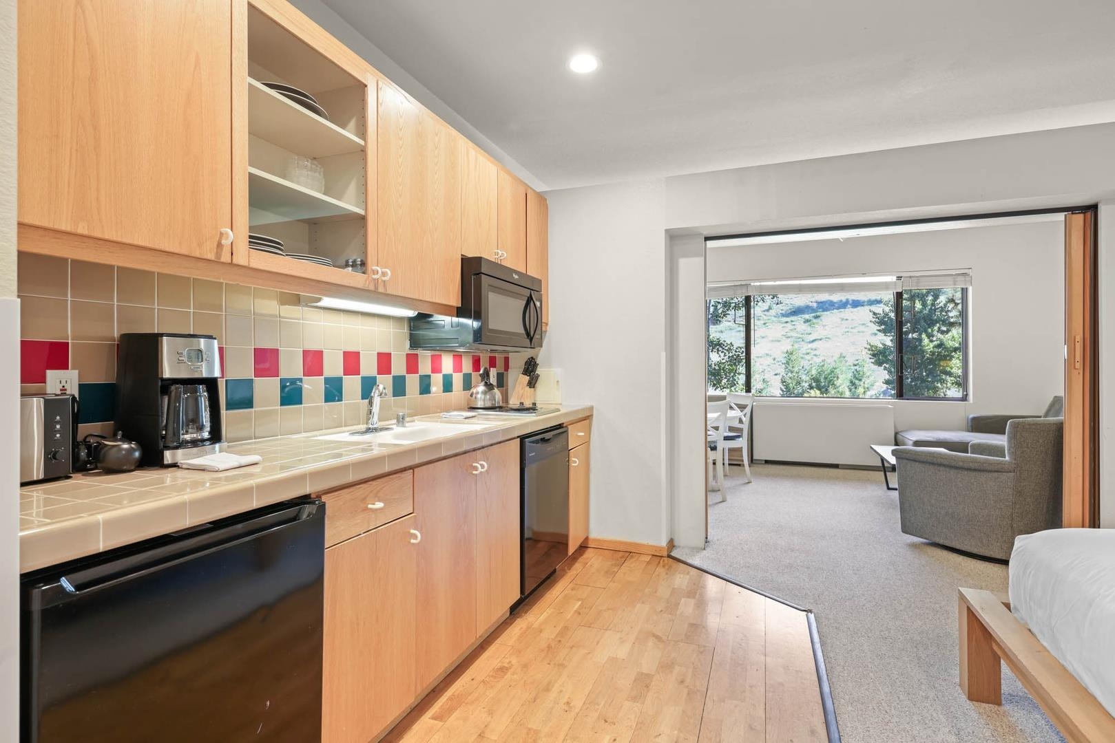 201 Shirley Cyn Road, Unit 247 Olympic Valley, CA 96146 - Photo 10 of 22 a kitchen with a sink stove and cabinets