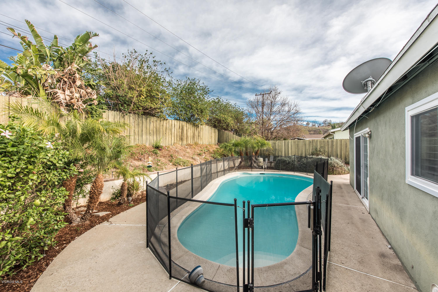 798 Appleton Road Simi Valley, CA 93065 - Photo 16 of 31 a view of a swimming pool with a patio