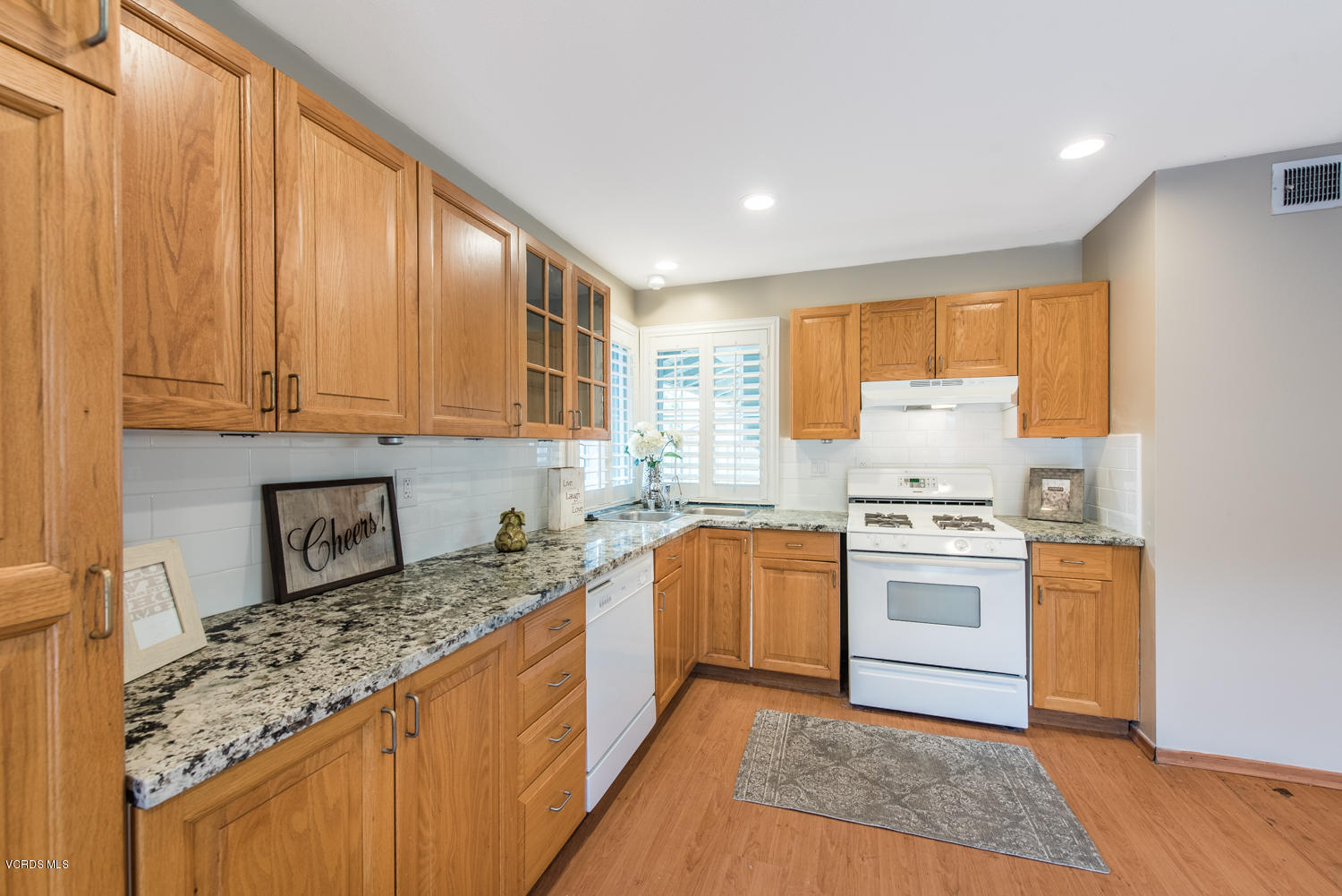 798 Appleton Road Simi Valley, CA 93065 - Photo 28 of 31 a kitchen with stainless steel appliances granite countertop a stove a sink dishwasher and a refrigerator