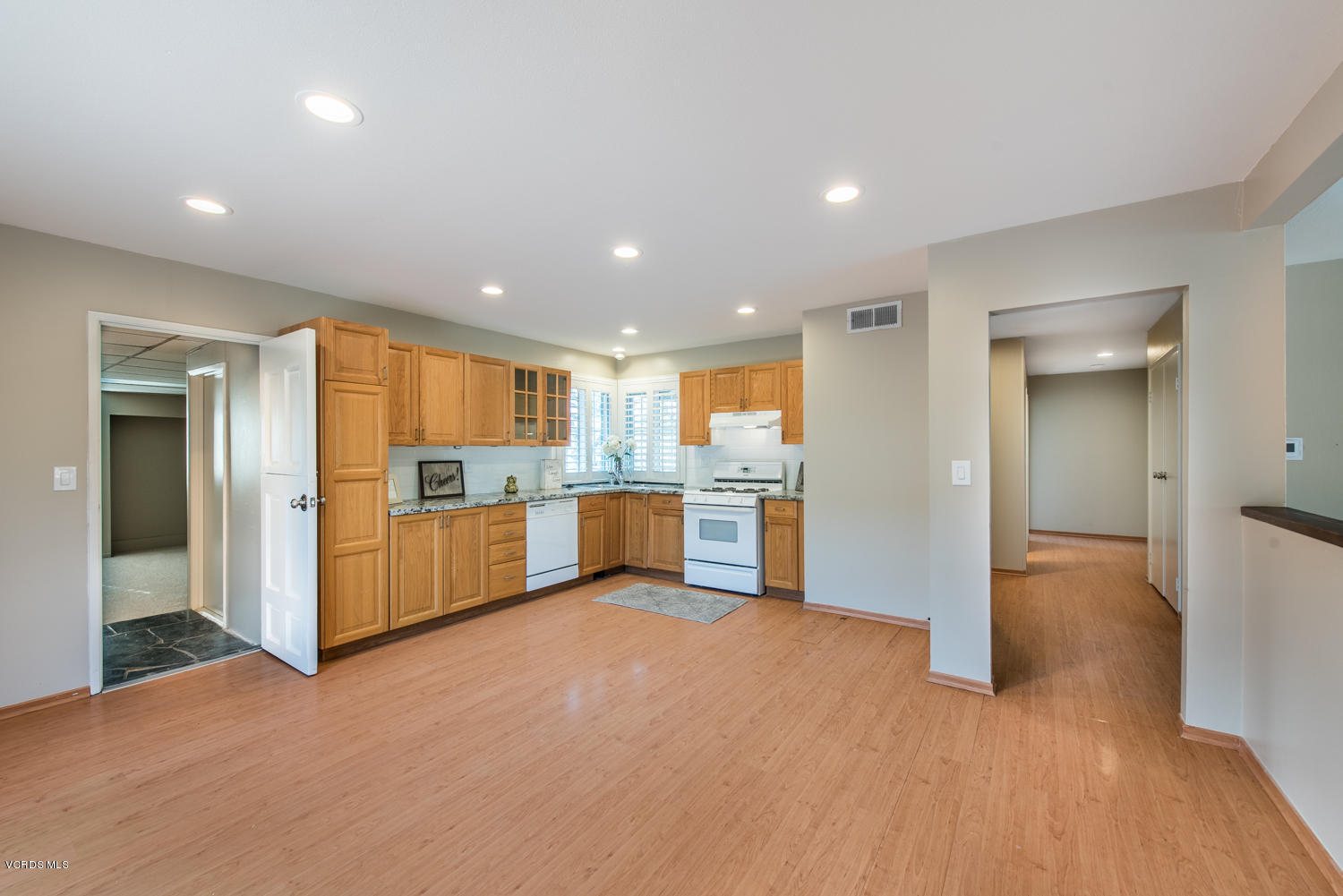 798 Appleton Road Simi Valley, CA 93065 - Photo 5 of 31 a view of kitchen with kitchen island wooden floor center island and stainless steel appliances