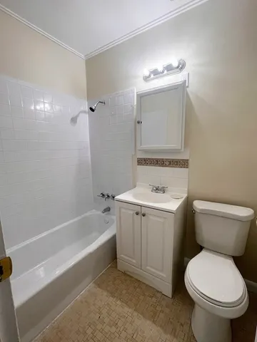 a bathroom with a sink a toilet and a bathtub