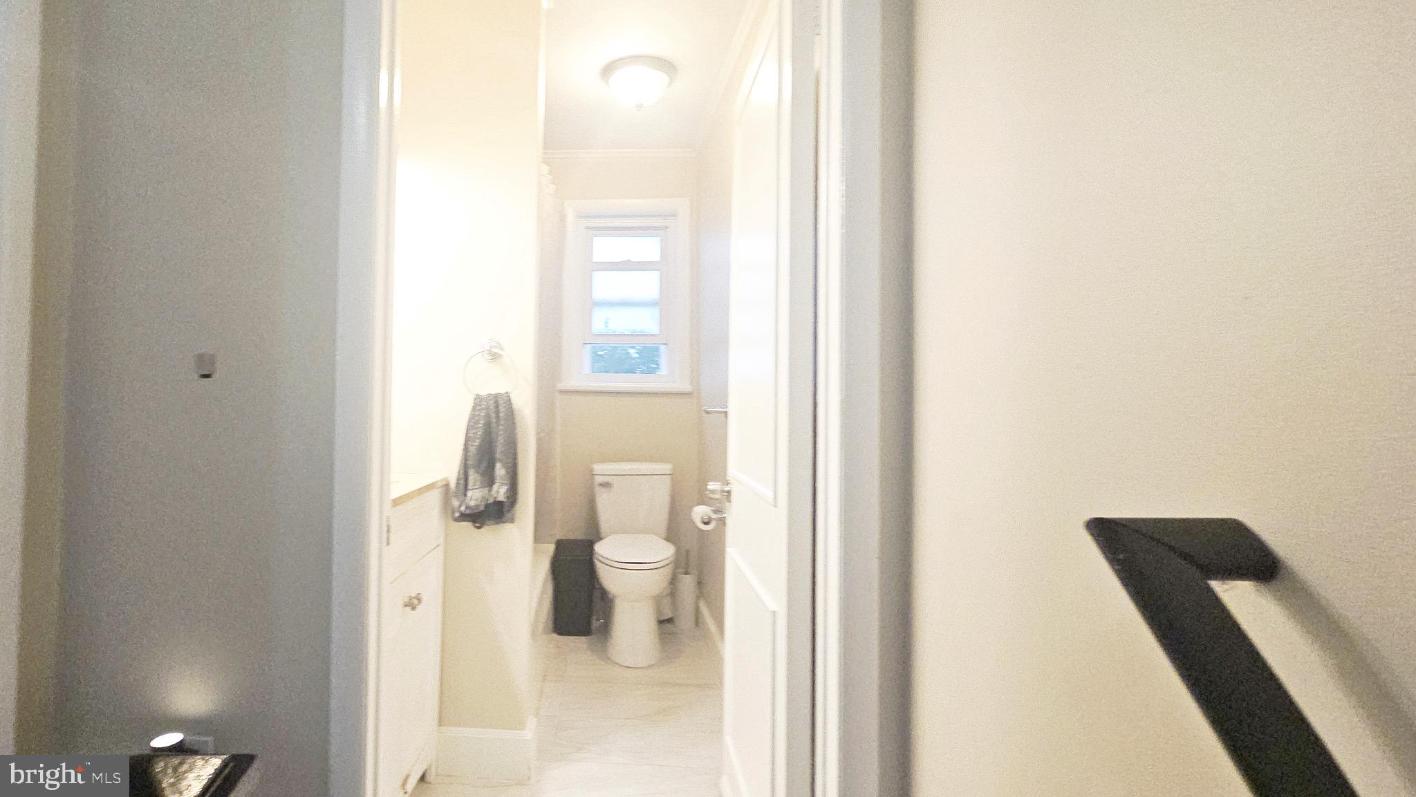 567 South Fairview Street Riverside, NJ 08075 - Photo 13 of 29 a bathroom with a toilet and a shower