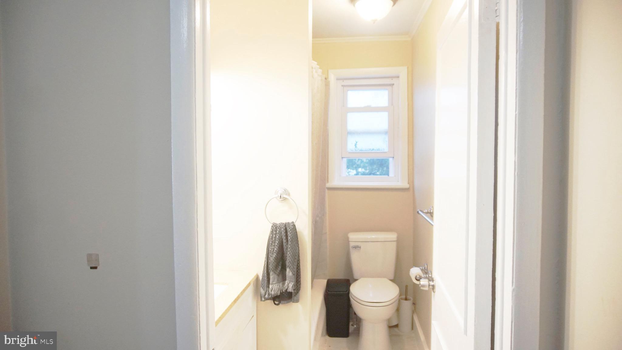 567 South Fairview Street Riverside, NJ 08075 - Photo 14 of 29 a bathroom with a toilet and a sink