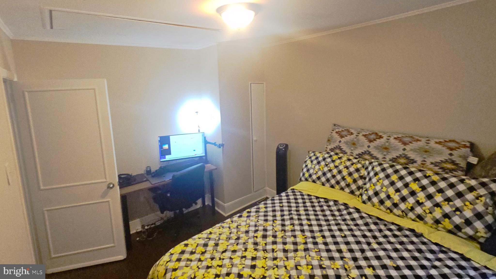 567 South Fairview Street Riverside, NJ 08075 - Photo 16 of 29 a bedroom with a bed and wooden floor