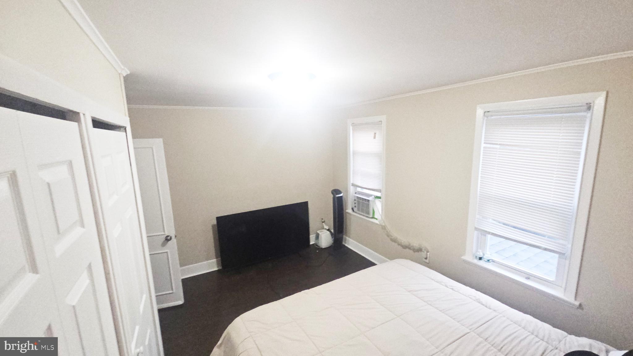 567 South Fairview Street Riverside, NJ 08075 - Photo 20 of 29 a bedroom with a bed and a window