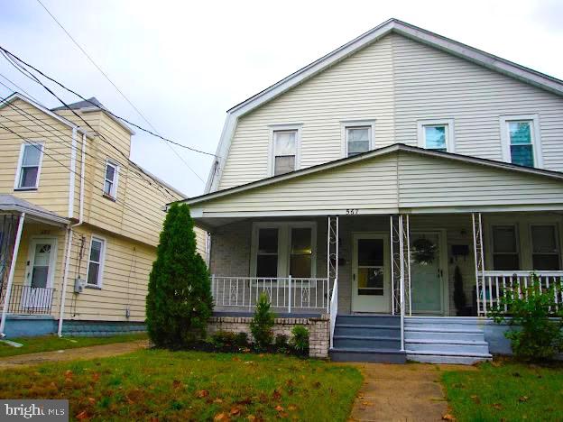 567 South Fairview Street Riverside, NJ 08075 - Photo 2 of 29 a view of small white house with a small yard and potted plants