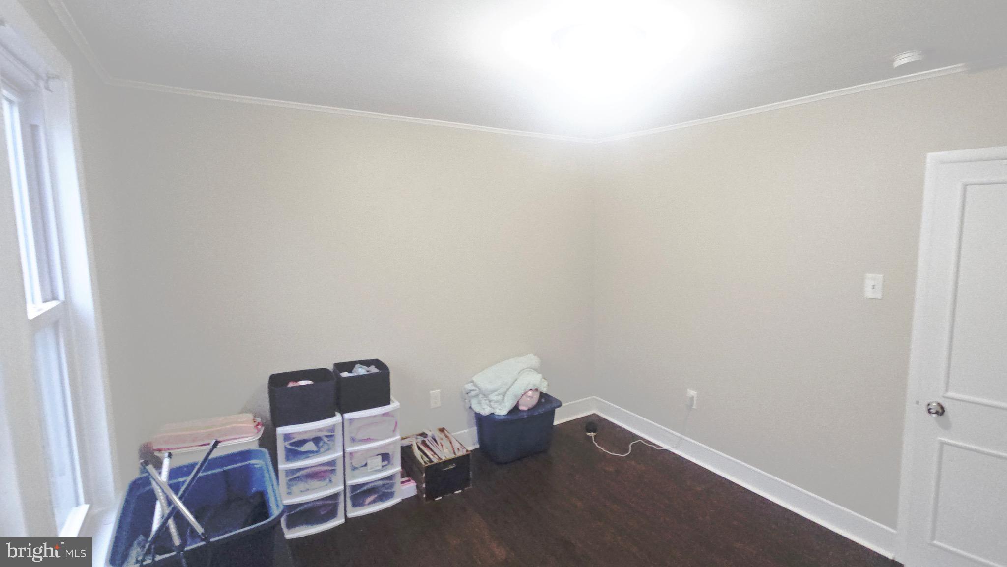 567 South Fairview Street Riverside, NJ 08075 - Photo 24 of 29 a room with a chair and white walls