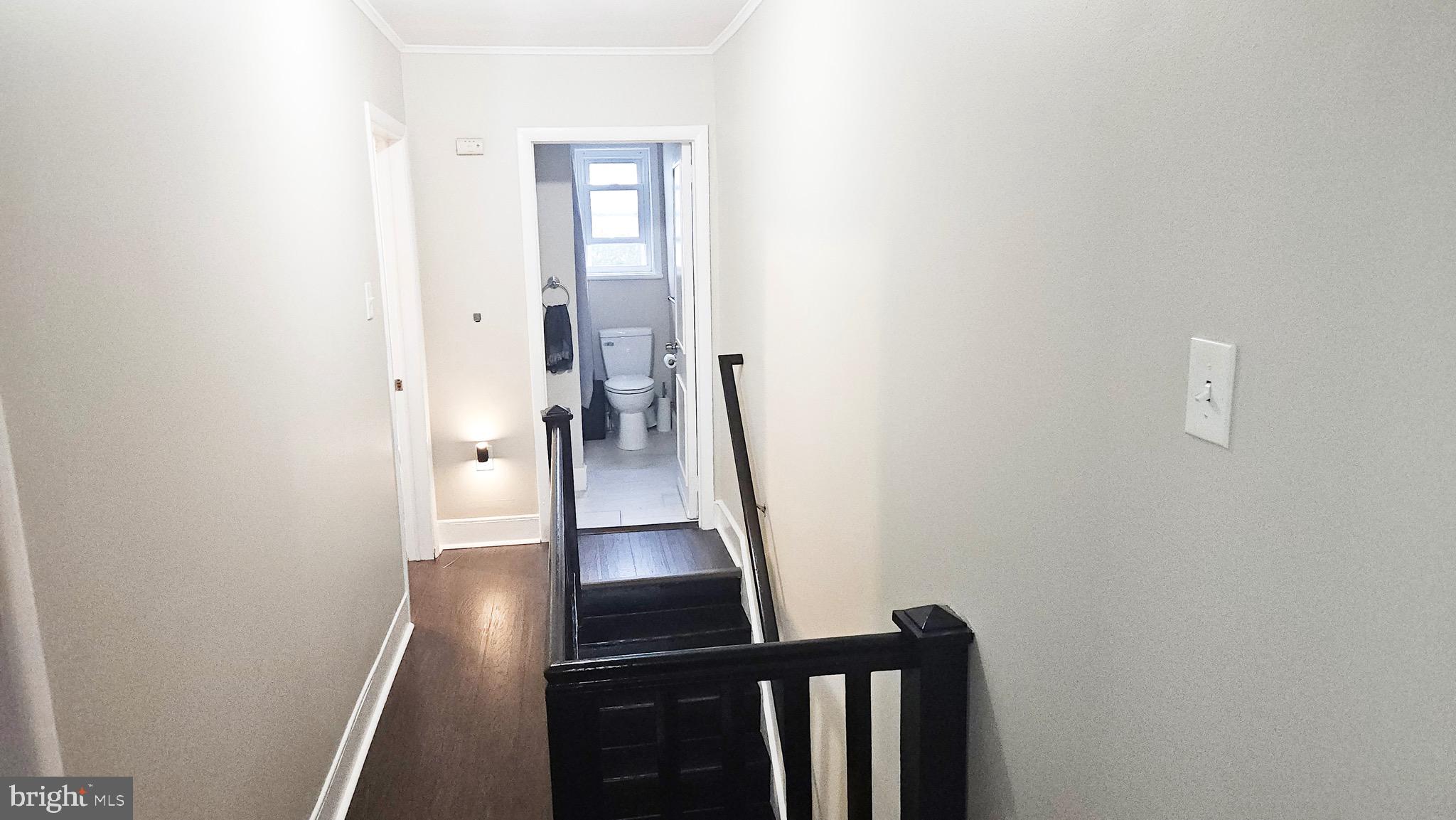 567 South Fairview Street Riverside, NJ 08075 - Photo 25 of 29 a view of hallway with wooden floor