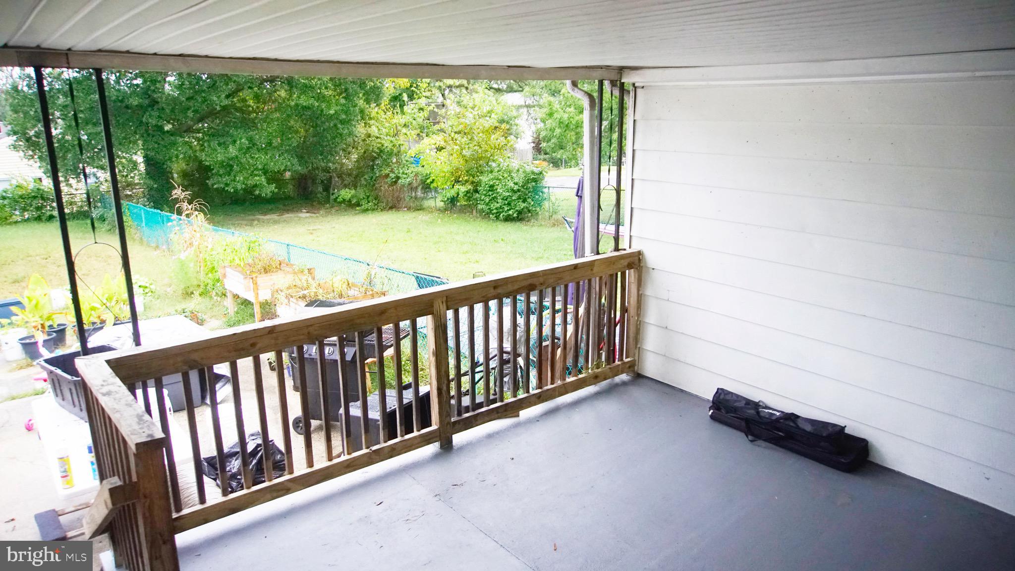 567 South Fairview Street Riverside, NJ 08075 - Photo 29 of 29 a view of a porch with wooden floor and fence