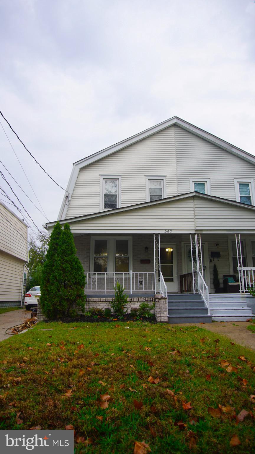 567 South Fairview Street Riverside, NJ 08075 - Photo 4 of 29 a front view of a house with garden