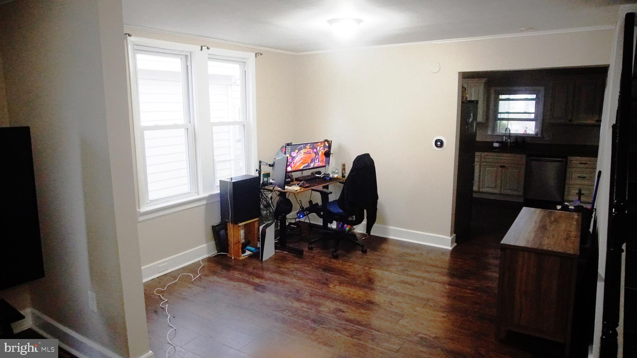 567 South Fairview Street Riverside, NJ 08075 - Photo 10 of 29 a view of a workspace with furniture and a window