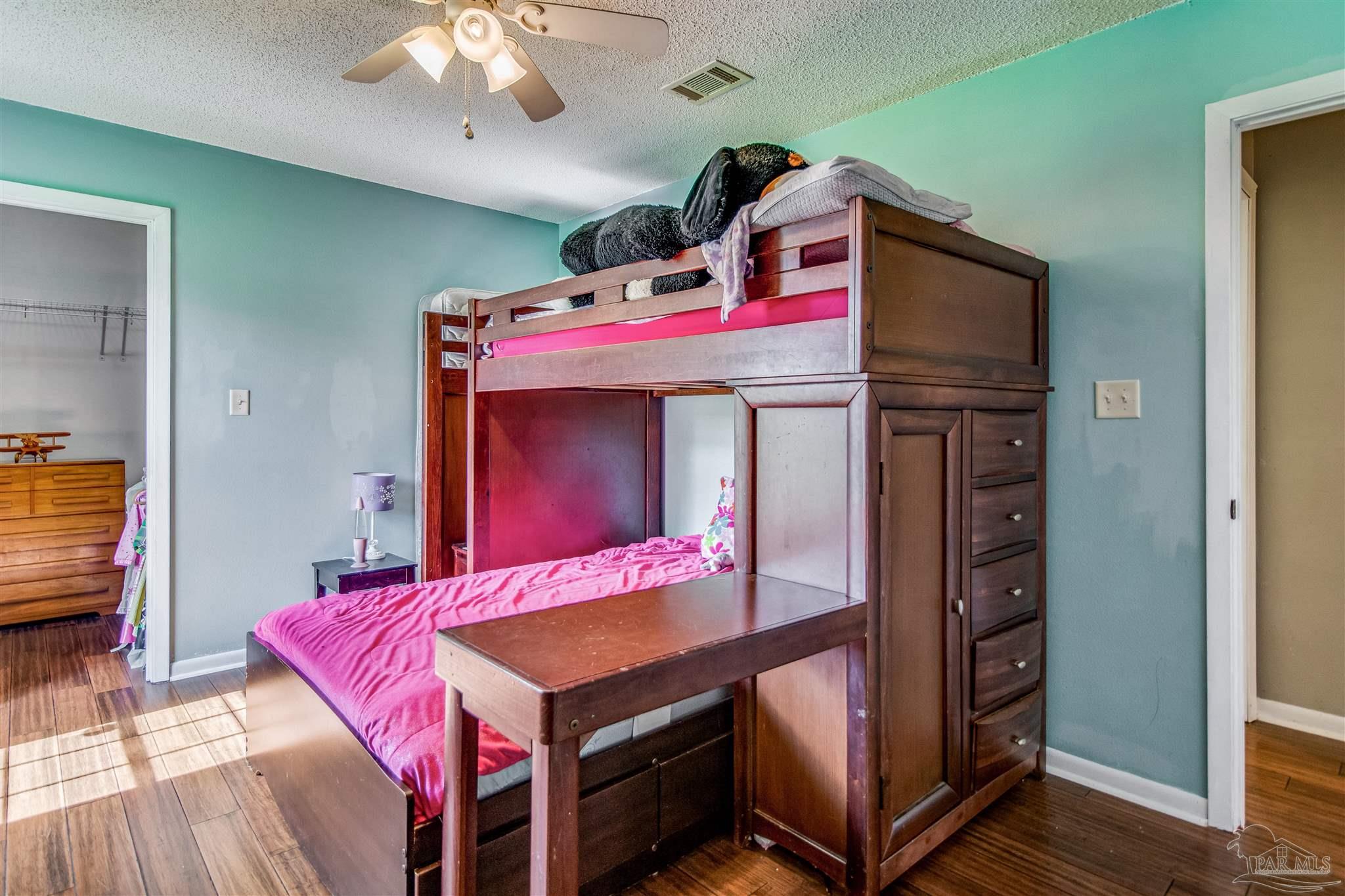5013 Bent Tree Road Milton, FL 32583 - Photo 14 of 50 with a walk-in closet