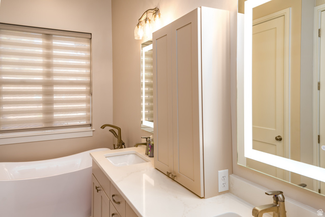 1283 North Gallen Road Santa Clara, UT 84765 - Photo 30 of 103 Primary en-suite Full bathroom with double vanity and a freestanding bath