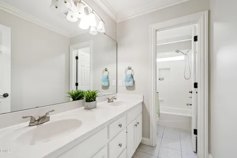 a view of balcony with wooden floor and fence