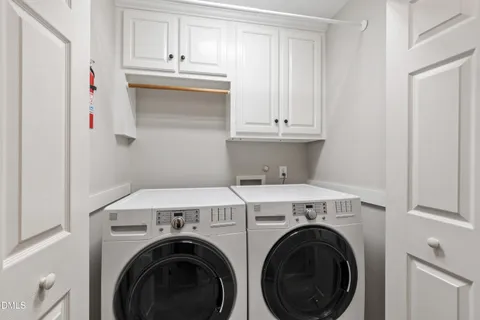 a view of backyard with a deck