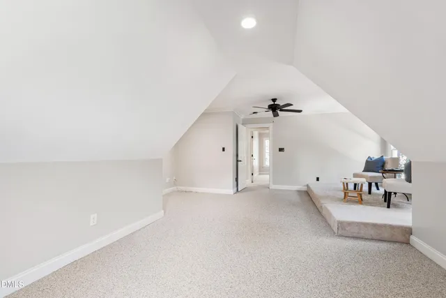 an aerial view of a house with a garden